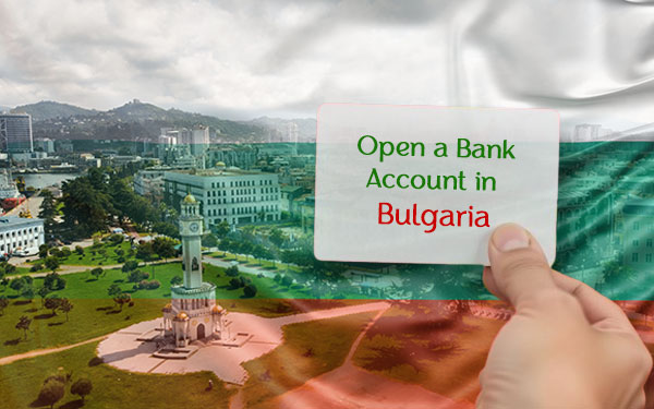 A hand holding a sign that reads open a bank account in Bulgaria